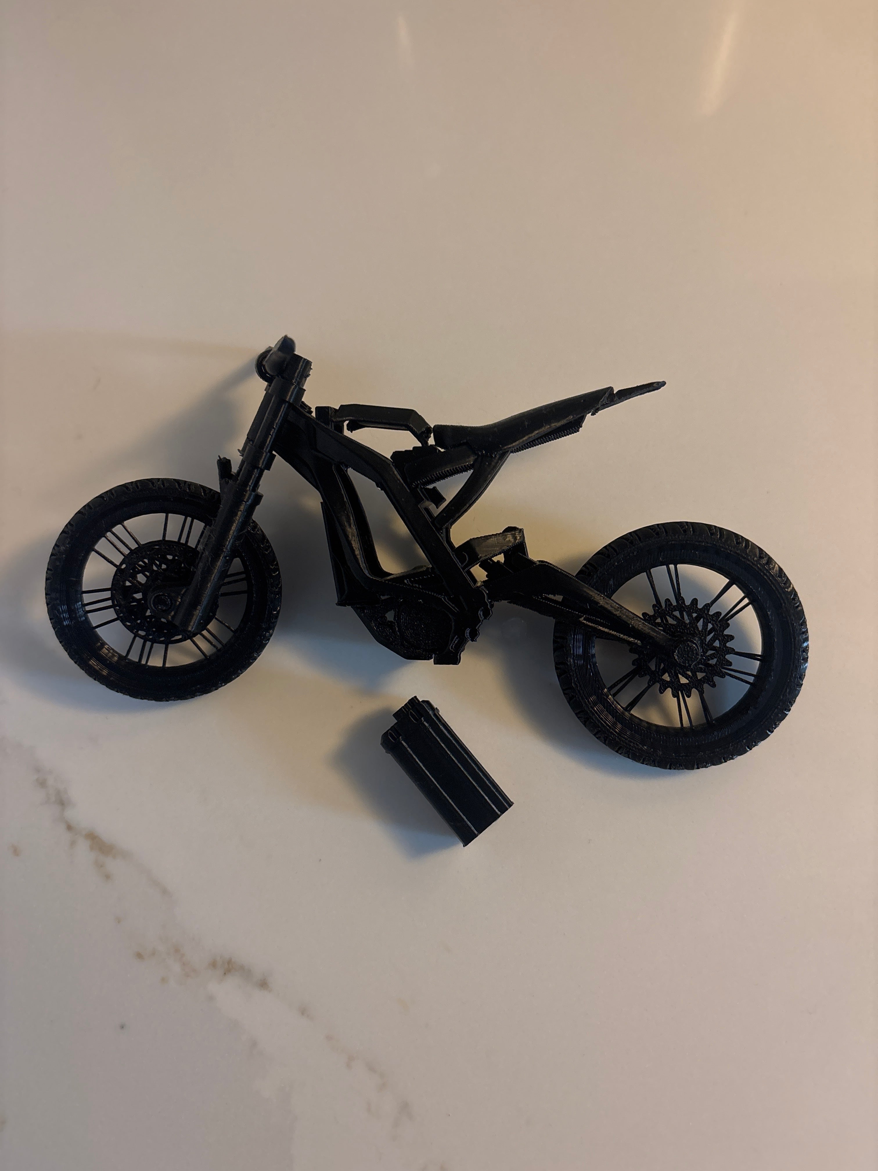 Black mini Surron removable battery