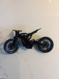 Black mini Surron removable battery