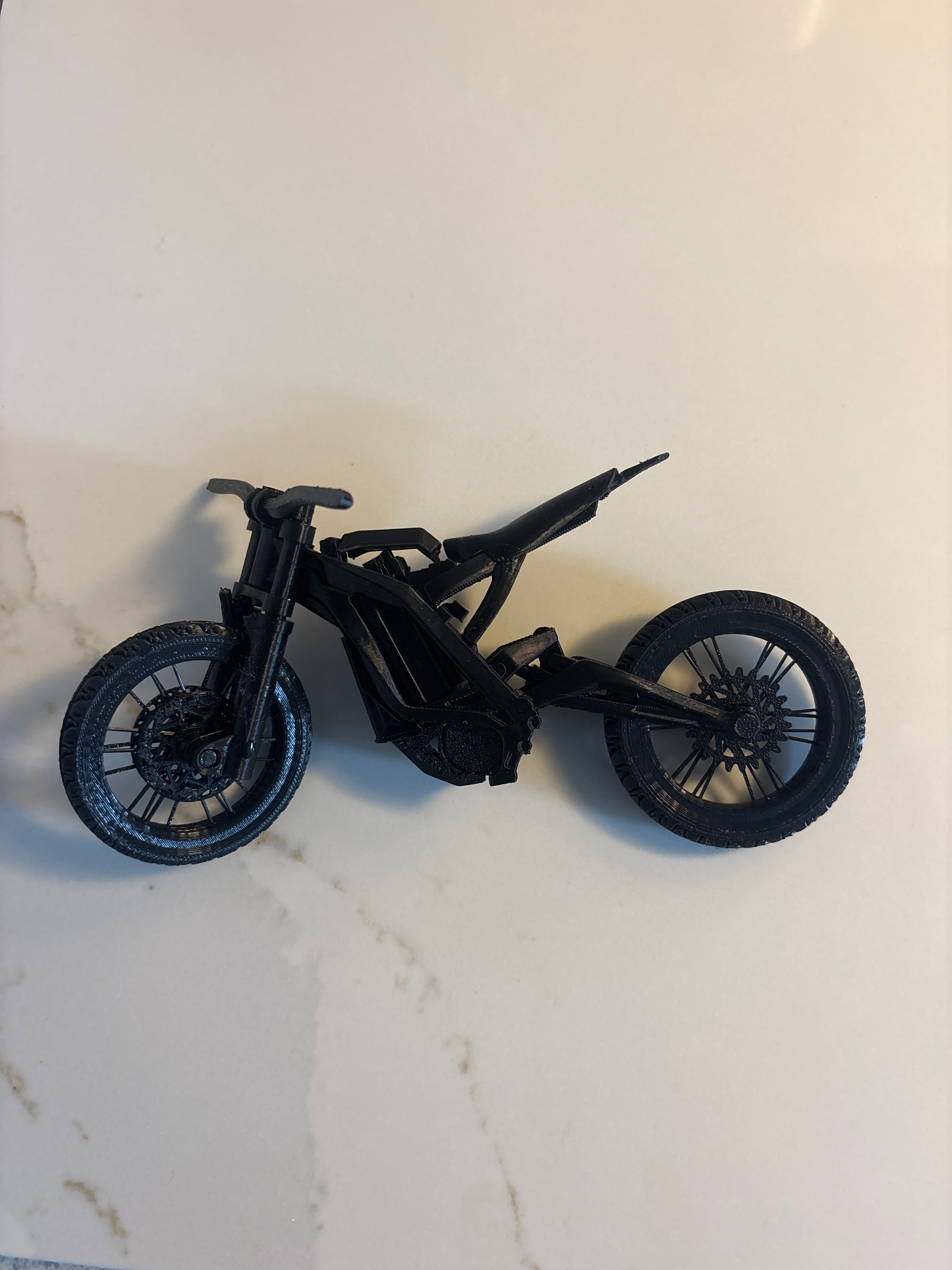 Black mini Surron removable battery