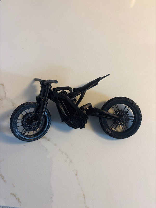 Black mini Surron removable battery